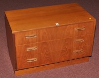 Lot 72 - G-Plan: a small chest of three long drawers,...