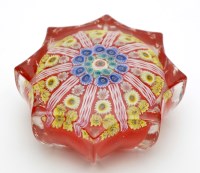 Lot 351 - Star-shaped spoked millefiori glass...