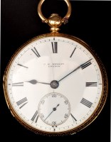 Lot 810 - A mid 19th Century 18ct. gold open faced key...