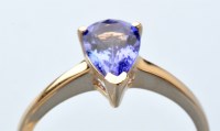 Lot 951 - A tanzanite ring, the pear-cut tanzanite...
