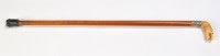 Lot 982 - A carved ivory handled malacca walking stick,...