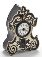 Lot 1286 - A miniature white metal and wooden mantel...