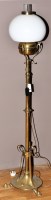 Lot 1303 - An art nouveau brass standard standard lamp...