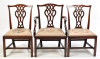 Lot 1368 - A set of six George III mahogany dining chairs,...