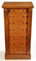 Lot 1401 - A late Victorian oak Wellington chest, fitted...