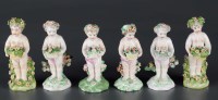 Lot 293 - Derby: four putti, circa 1760, each holding a...