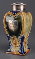 Lot 308 - Doulton, Lambeth: a silver mounted tea caddy...