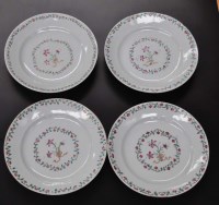 Lot 452 - Four Chinese export plates, with central...