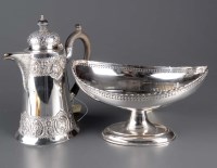 Lot 515 - An EPNS embossed circular tapered hot water...