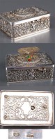 Lot 718 - An ornate Swiss white metal ''Singing Bird''...