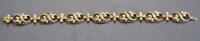Lot 800 - A Victorian seed pearl and gold bracelet,...