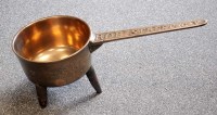 Lot 574 - A bronze skillet, the circular pan with...