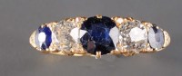 Lot 868 - A sapphire and diamond ring, circa 1890, the...