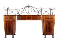 Lot 1017 - A Regency mahogany breakfront sideboard, the...