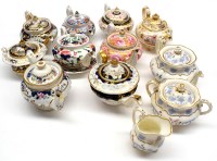 Lot 96 - A collection of mainly melon form teapots,...