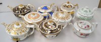 Lot 154 - Nine teapots of squat circular form, 19th...