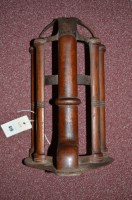 Lot 419 - A cast iron and mahogany wall bracket for...