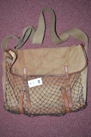 Lot 436 - An unnamed canvas game bag with canvas strap.