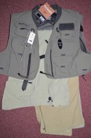 Lot 456 - Two pairs of lightweight trousers in pale...