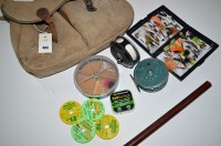 Lot 493 - Canvas fishing tackle bag, containing: two...