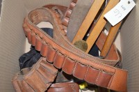 Lot 597 - Two cartridge belts, a pair of waders, etc.