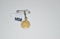 Lot 1450 - A George III spade guinea, 1793, with soldered...