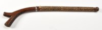 Lot 231 - A Fijian Sali club, the carved head with...