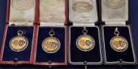 Lot 291 - Four 9ct. yellow gold and enamel...