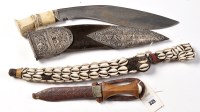 Lot 335 - A 19th Century Indian kukri, the curved 30cms...