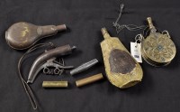 Lot 368 - An 18th Century brass and steel mounted powder...