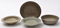Lot 519 - Two small carved Chinese Celadon dishes, with...