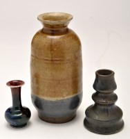 Lot 556 - Chinese 'Flambe' glaze candle holder, of squat...