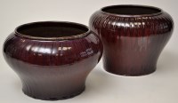 Lot 575 - Two Chinese flambe glaze jars, of bulbous pear...
