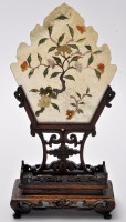 Lot 601 - Chinese hardstone panel on stand, the panel of...