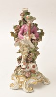 Lot 652 - Figure of a piping shepherd, probably Chelsea,...