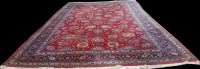 Lot 1072 - A Tabriz carpet, with bold floral motifs on...