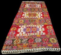 Lot 1083 - A Caucasian Kilim runner, with bold geometric...