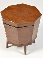 Lot 1153 - A George III mahogany octagonal cellarette,...