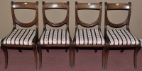 Lot 1192 - A set of four fine Recency mahogany dining...