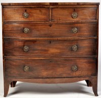 Lot 1194 - A George III mahogany bowfront chest of two...