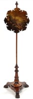 Lot 1196 - A Regency mahogany pole screen, the painted...