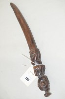 Lot 118 - A Yoruba wooden divination tapper depicting a...