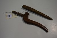 Lot 240 - Two 19th Century treen knitting sheaths, one...