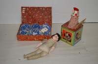 Lot 322 - An unnamed bisque headed doll with glass eyes...