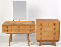 Lot 952 - A mid 20th Century walnut veneered six drawer...