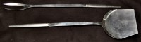 Lot 1015 - A vintage meat fork and spatula, stamped 'T.W....