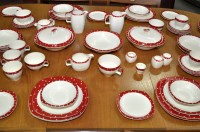 Lot 1039 - Midwinter: an extensive tea and dinner service,...