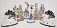 Lot 1055 - Rye Pottery: a pair of bookends, depicting man...