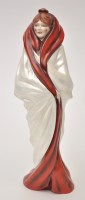 Lot 1057 - Michael Sutty: a porcelain figure of a woman...