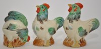 Lot 1064 - Clarice Cliff: a novelty three piece cruet set,...